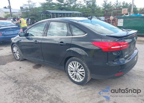 2015 Ford Focus Titanium from USA, damaged, VIN 1FADP3J28FL213712